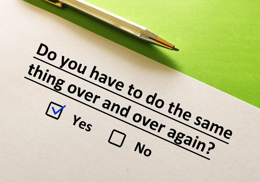 One person is answering question. The person thinks that his work has to do the same thing over and over again.